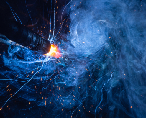 Closeup welding torch of Flux Core Welding process